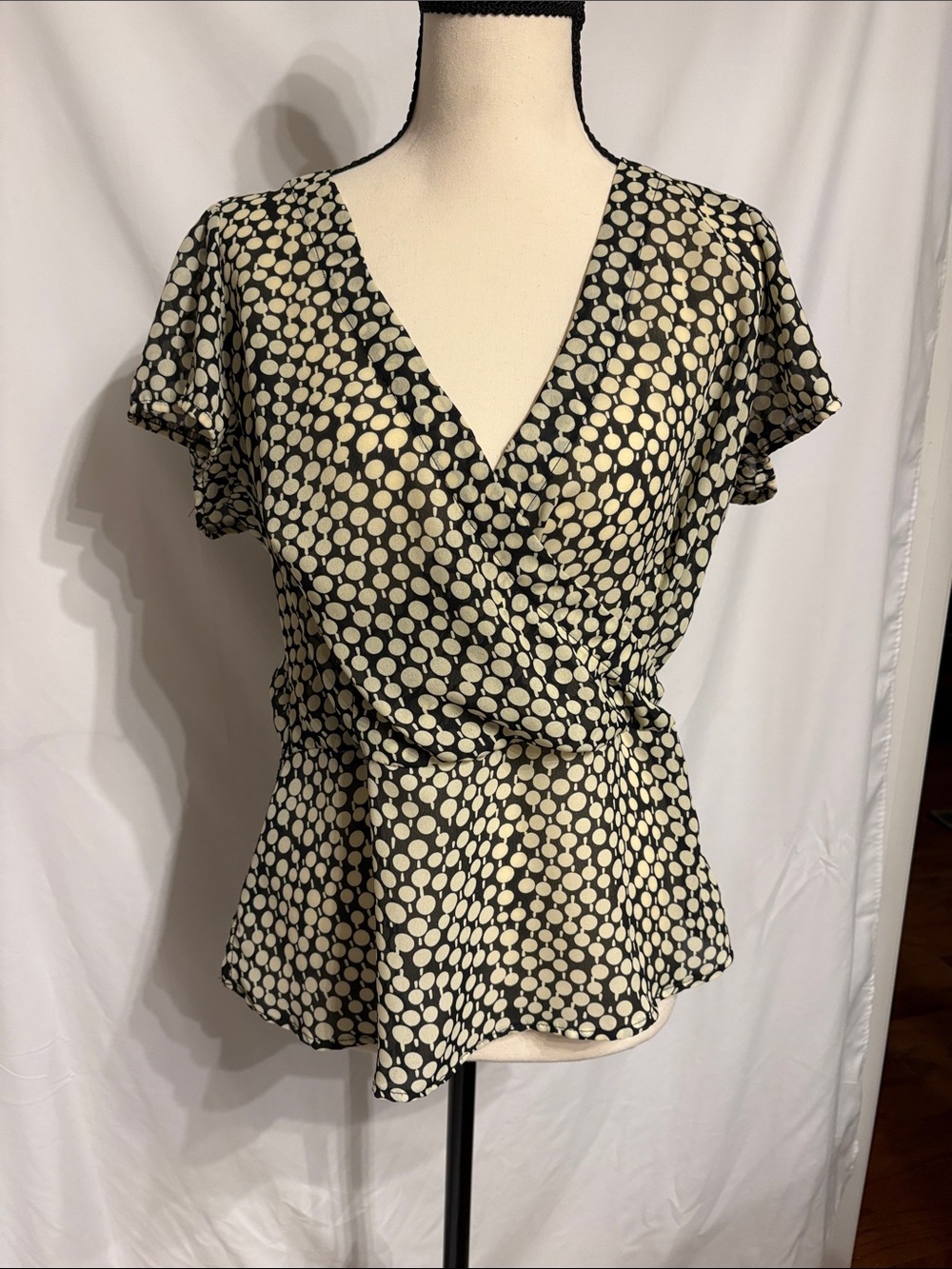 Sere Nade L Dot-Print Peplum Blouse in Black and Cream Officewear